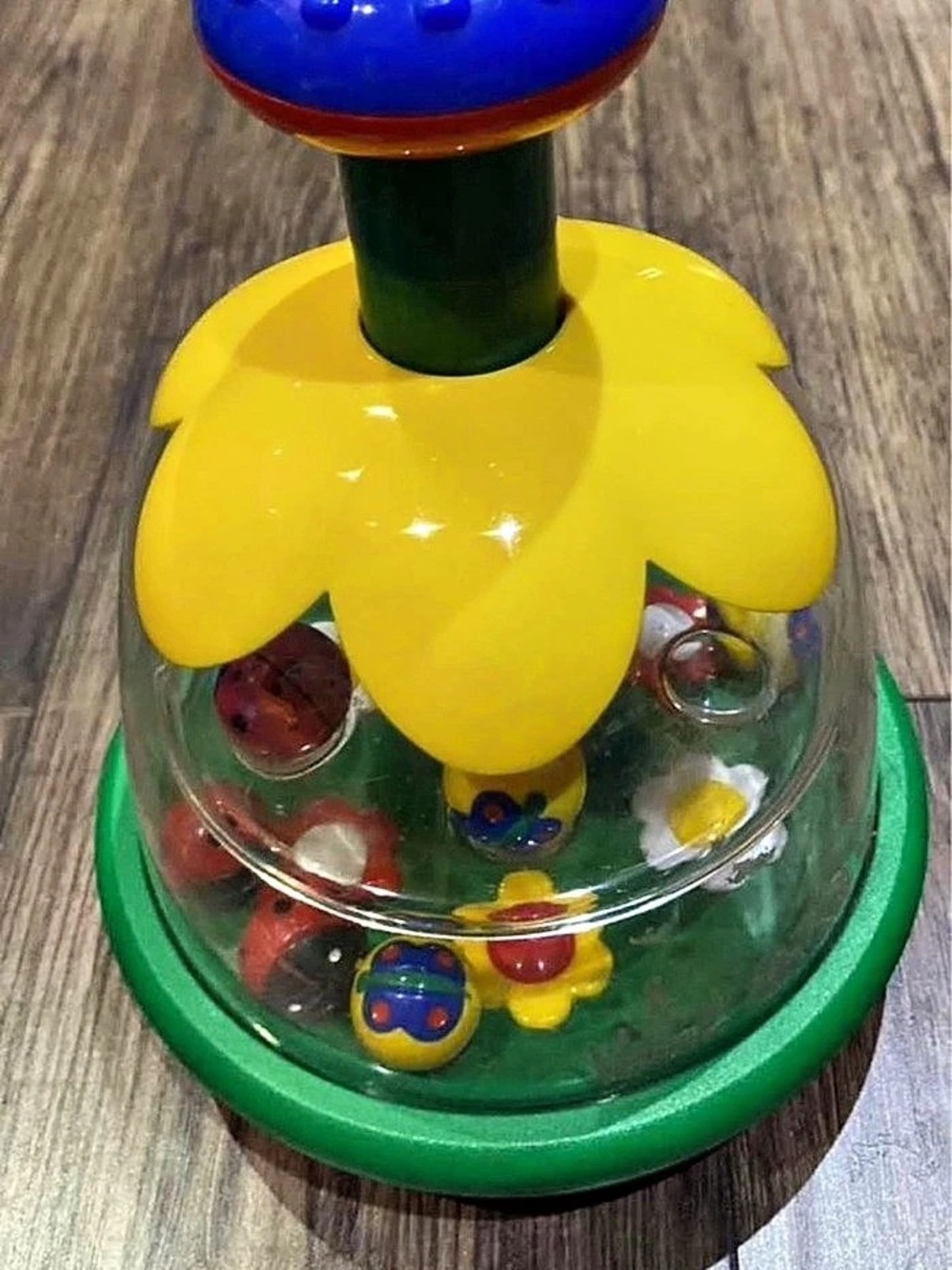 chicco Rainbow Spinner Learning Toy in Green & Yellow